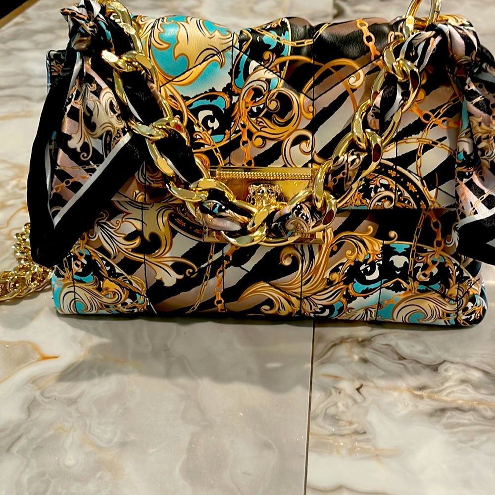 Also Jermeyx chain strap bag